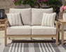 Hallow Creek Outdoor Loveseat with Cushion - De Avenue Furniture
