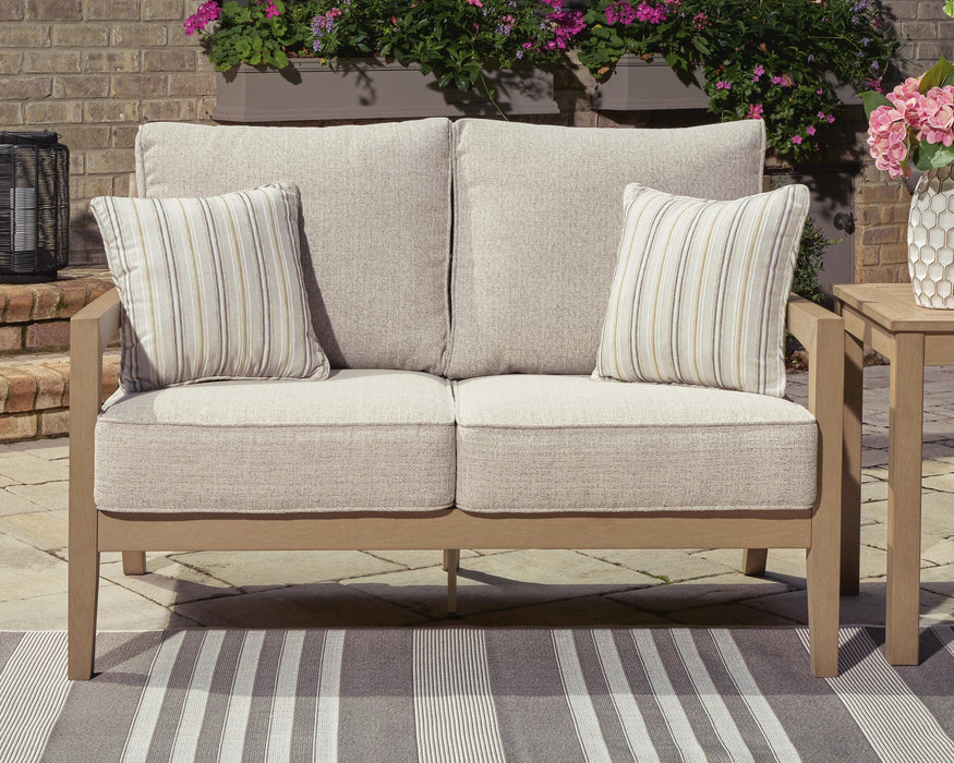Hallow Creek Outdoor Loveseat with Cushion - De Avenue Furniture