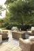 Beachcroft Beachcroft Fire Pit Table with Four Nuvella Swivel Lounge Chairs - De Avenue Furniture