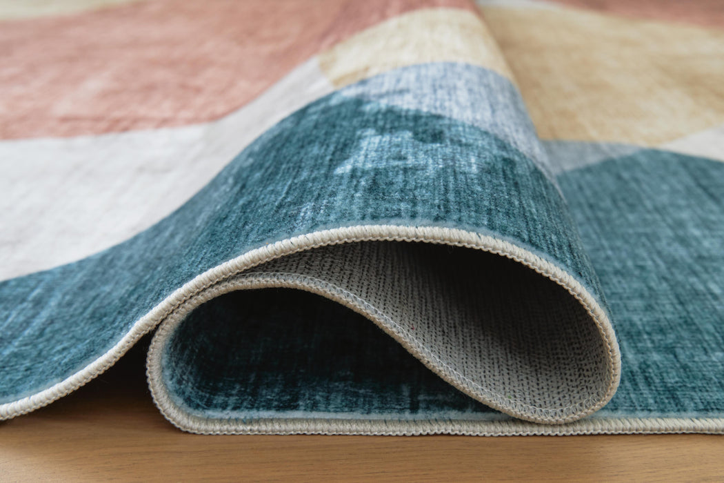 Chanleigh Washable 7'6" x 9'6" Area Rug - De Avenue Furniture