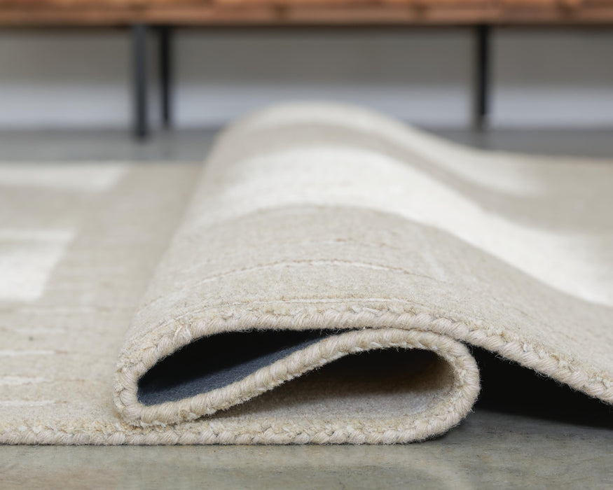 Wolbert 7'8" x 10' Area Rug - De Avenue Furniture