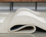 Wolbert 7'8" x 10' Area Rug - De Avenue Furniture