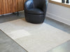 Wolbert 5' x 7' Area Rug - De Avenue Furniture